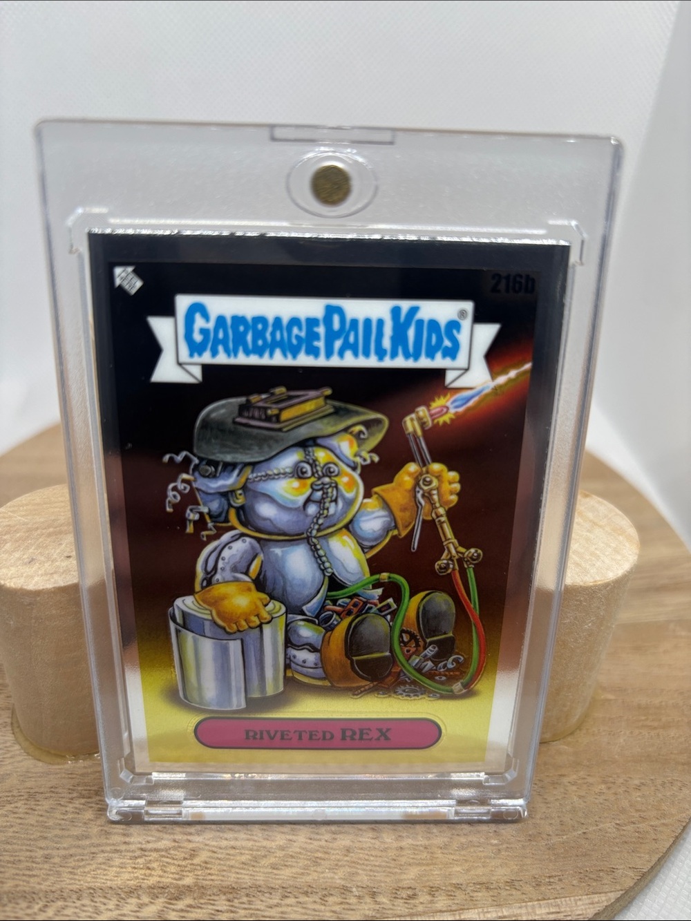 Garbage Pail Kids Riveted Rex Trading Card - Yellow & Blue Artwork